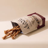 Land Animal Beef Tendon Chews treats pouring from the pouch
