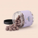 Land Animal Calming Aid for Cats soft chews spilling from the jar