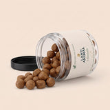 Land Animal Hairball for Cats soft chews spilling from the jar