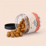 Land Animal Skin & Coat Omega for Cats soft chews spilling from the jar
