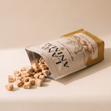 Land Animal Chicken Breast Bites treats pouring from the pouch