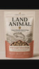 Land Animal Wild-Caught Salmon freeze-dried raw dog food poured into a bowl