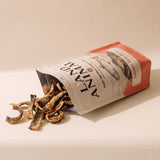 Land Animal Salmon Skin Bites treats pouring from the pouch