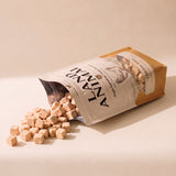 Land Animal Chicken Bites for Cats treats spilling from pouch